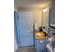 Bright bathroom vanity with granite countertop, and updated fixtures at 2805 W Patterson St, Tampa, FL 33614
