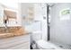 Bright bathroom features granite countertop, updated shower, and mosaic tile accents at 2805 W Patterson St, Tampa, FL 33614