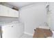 Functional laundry room features modern washer and dryer units, and convenient sink at 2805 W Patterson St, Tampa, FL 33614