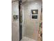 Modern shower features upgraded panel system and mosaic tile accents at 2805 W Patterson St, Tampa, FL 33614