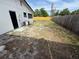 Backyard of the home featuring a wood fence and an AC unit at 29813 69Th N St, Clearwater, FL 33761