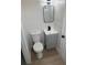 Bathroom with gray vanity and a modern black faucet at 29813 69Th N St, Clearwater, FL 33761