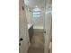 Charming updated bathroom featuring modern tiling, a rain shower head, vanity, and modern finishes at 29813 69Th N St, Clearwater, FL 33761