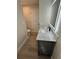 Bathroom vanity with a modern light-up mirror, granite countertop, and updated faucet at 29813 69Th N St, Clearwater, FL 33761