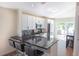 Contemporary kitchen featuring a breakfast bar, stainless steel appliances, and bright lighting at 302 Summer Sails Dr, Valrico, FL 33594