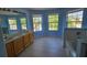 Primary bathroom featuring dual sinks, tub, and natural light from multiple windows at 3109 Chessington Dr, Land O Lakes, FL 34638