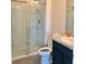 Clean bathroom showcasing glass shower, vanity, and essential fixtures at 32699 Dashel Palm Ln, Wesley Chapel, FL 33543