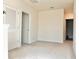 An adaptable upstairs loft with soft carpet provides an open and versatile space at 32699 Dashel Palm Ln, Wesley Chapel, FL 33543