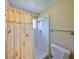 Bathroom featuring a shower with decorative curtain and white shower stall at 3928 90Th N Ter, Pinellas Park, FL 33782