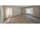 Bedroom featuring neutral carpet and bright windows for a relaxing and comfortable atmosphere at 3928 90Th N Ter, Pinellas Park, FL 33782