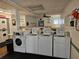 On-site laundry room with multiple washers for residents' convenience at 4206 Tamargo Dr # 4206, New Port Richey, FL 34652