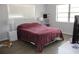 Cozy bedroom featuring a comfortable bed, soft lighting, and a serene atmosphere at 4363 Elwood Rd, Spring Hill, FL 34609