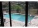 View of the swimming pool with a brick paver surround at 4363 Elwood Rd, Spring Hill, FL 34609