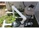 Swimming pool pump equipment surrounded by weeds at 4363 Elwood Rd, Spring Hill, FL 34609