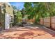 Spacious backyard with a well-maintained patio and new wooden fence, ideal for outdoor relaxation and activities at 4400 2Nd S Ave, St Petersburg, FL 33711
