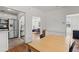 Bright dining area that provides convenient access to the living room and kitchen at 4400 2Nd S Ave, St Petersburg, FL 33711