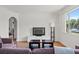 Open-concept living room with hardwood floors, perfect for entertaining guests at 4400 2Nd S Ave, St Petersburg, FL 33711