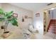 Bathroom with a large tub, toilet and floral wallpaper at 4610 47Th N Way, St Petersburg, FL 33702