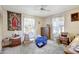 A bright bedroom with a ceiling fan, natural light and furnishings, ready to personalize and make your own at 4610 47Th N Way, St Petersburg, FL 33702