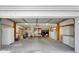 A large garage with shelving, storage, and plenty of room for parking and projects at 4610 47Th N Way, St Petersburg, FL 33702