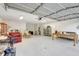 Spacious garage area with high ceilings, concrete floors, and ample room for storage at 4610 47Th N Way, St Petersburg, FL 33702