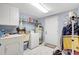 Laundry room with washer, dryer, and lots of storage space at 4610 47Th N Way, St Petersburg, FL 33702