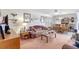 Inviting living area with large windows, ceiling fan, and combination dining room at 4610 47Th N Way, St Petersburg, FL 33702