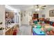 Living room with a doorway and lots of clutter at 4610 47Th N Way, St Petersburg, FL 33702