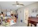 Bedroom features ceiling fan, and adjoined bathroom, natural light at 4610 47Th N Way, St Petersburg, FL 33702
