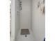 Standing shower with built in shelves and clean white tiling throughout at 4610 47Th N Way, St Petersburg, FL 33702