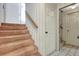 Carpeted stairway leading to the upper level of the home at 4610 47Th N Way, St Petersburg, FL 33702