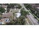 An aerial view of the neighborhood, showcasing the layout and adjacent tree-lined street at 4735 W Wisconsin Ave, Tampa, FL 33616