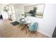 Bright dining area featuring a glass table, plush chairs, and stylish decor at 4735 W Wisconsin Ave, Tampa, FL 33616