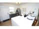 Modern kitchen with stainless steel appliances, stylish bar stools, and modern accents at 4735 W Wisconsin Ave, Tampa, FL 33616