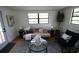 Cozy living room with comfortable seating, natural light, and modern decor at 4735 W Wisconsin Ave, Tampa, FL 33616