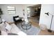 Comfortable seating area with modern furniture, neutral colors, and a clear sight line at 4735 W Wisconsin Ave, Tampa, FL 33616