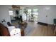 Bright living room with large windows, contemporary decor, and natural light at 4735 W Wisconsin Ave, Tampa, FL 33616