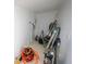 Utility room with storage solutions and a variety of equipment, perfect for organization at 4735 W Wisconsin Ave, Tampa, FL 33616