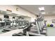 Well-equipped gym featuring modern treadmills, weights, and mirrors at 5500 Gulf Blvd # 2249, St Pete Beach, FL 33706