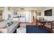 Comfortable hotel suite offering a living room, dining area, and well-equipped kitchen at 5500 Gulf Blvd # 2249, St Pete Beach, FL 33706
