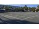 Well-maintained tennis court, perfect for recreation in this tropical resort setting at 5500 Gulf Blvd # 2249, St Pete Beach, FL 33706