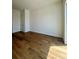 Empty bedroom with hardwood floors and a large window with natural lighting at 600 3Rd S Ave # 503, St Petersburg, FL 33701