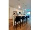 Modern kitchen with island, pendant lighting, and stainless steel appliances at 600 3Rd S Ave # 503, St Petersburg, FL 33701
