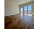 Open living room with wood flooring, large windows, and ample natural light at 600 3Rd S Ave # 503, St Petersburg, FL 33701