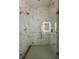 Elegant shower with frameless glass and stylish marble tile throughout at 600 3Rd S Ave # 503, St Petersburg, FL 33701