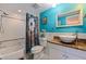 Well-lit bathroom with bright walls, bathtub with shower, and single sink vanity at 6219 57Th N Ave, St Petersburg, FL 33709