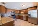 Spacious kitchen featuring stainless steel appliances, granite countertops, and ample cabinetry at 6219 57Th N Ave, St Petersburg, FL 33709