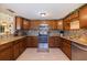 Charming kitchen with granite countertops, stainless steel appliances, and tiled flooring at 6219 57Th N Ave, St Petersburg, FL 33709