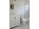 Bathroom with white vanity with drawers and a white toilet at 6241 Westport Dr, Port Richey, FL 34668