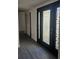 Inviting entryway with sleek flooring and decorative glass front door at 6241 Westport Dr, Port Richey, FL 34668